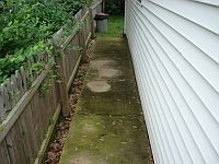 Sidewalk covered in slippery mold and moss, now safe and beautiful.